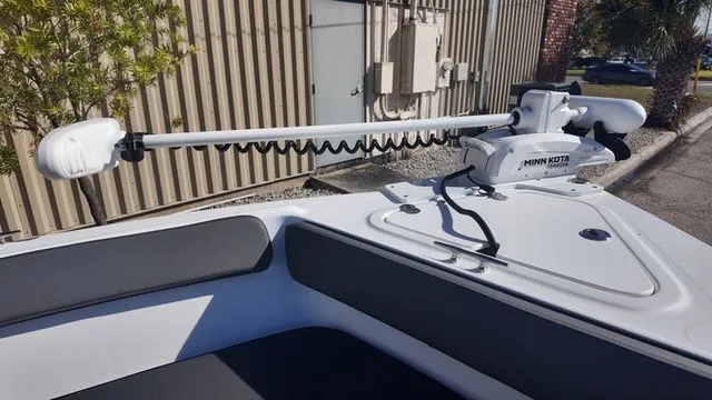 Slide: The Image of 2026 ALK2 Powerboats 23CRX with Minn Kota trolling motor on deck. - 22