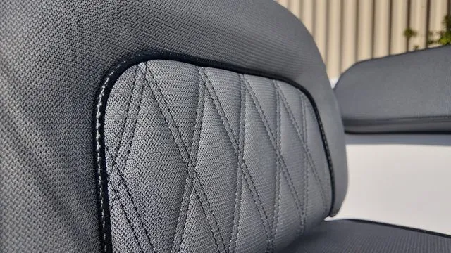 Slide: The Image of 2026 ALK2 Powerboats 23CRX seat with diamond-stitched gray upholstery. - 24