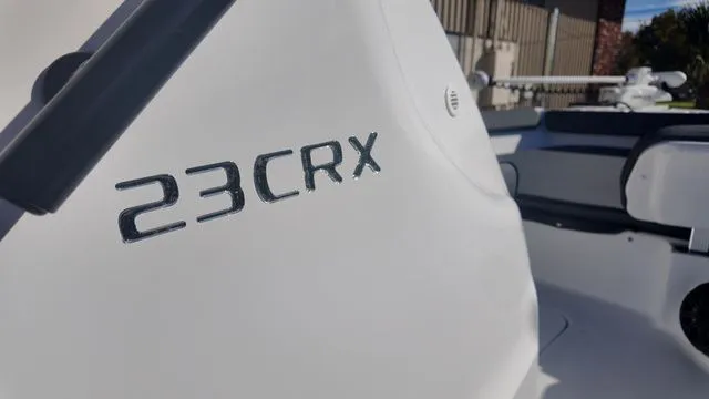 Slide: The Image of 2026 ALK2 Powerboats 23CRX model, close-up of sleek white exterior design. - 29