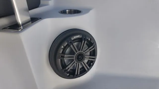 Slide: The Image of Speaker and cup holder on 2026 ALK2 Powerboats 23CRX interior. - 39