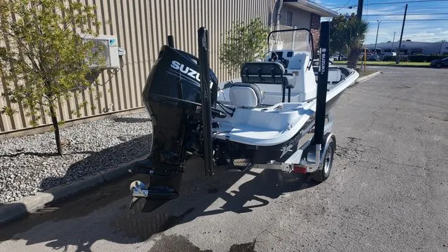 Slide: The Image of 2026 ALK2 Powerboats 23CRX with Suzuki engine on trailer, parked outdoors. - 6
