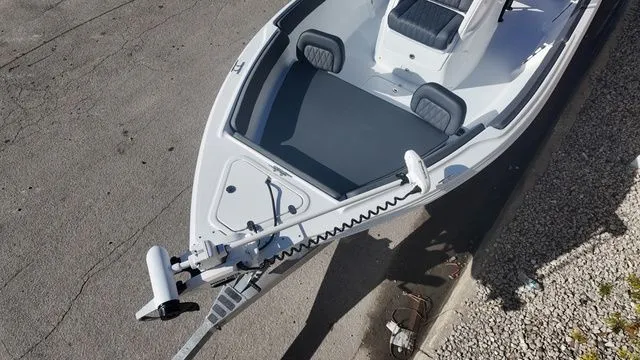 Slide: The Image of 2026 ALK2 Powerboats 23CRX, top view of sleek white deck and seating. - 9