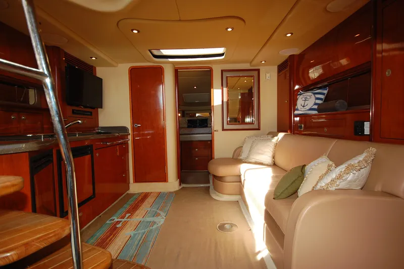 Slide: The Image of Luxurious interior of 2004 Sea Ray 390 Sundancer yacht with plush seating and modern amenities. - 20
