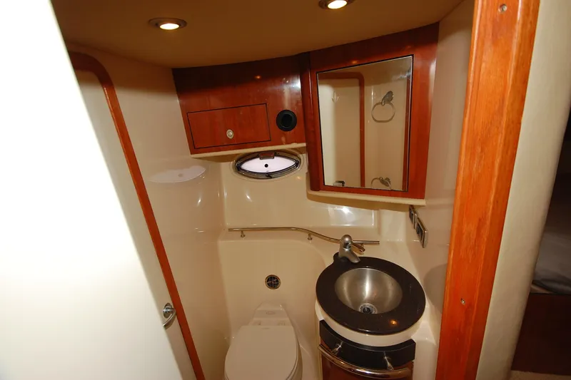 Slide: The Image of Luxurious bathroom in 2004 Sea Ray 390 Sundancer yacht with modern fixtures. - 33