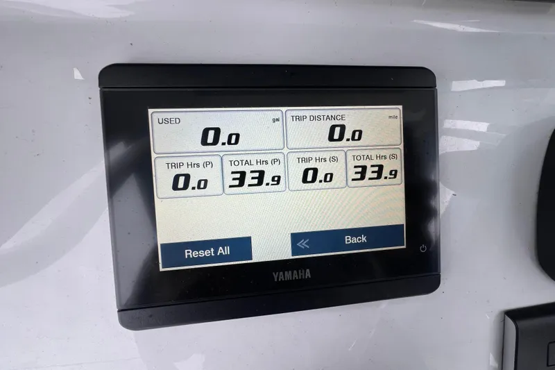 Slide: The Image of Yamaha display showing trip and total hours for Sea Hunt Gamefish 27, 2025 model. - 9