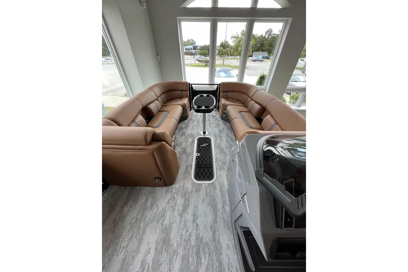 Slide: The Image of Luxurious interior of 2026 Starcraft RX 25 DL DC boat with plush seating and modern design. - 12