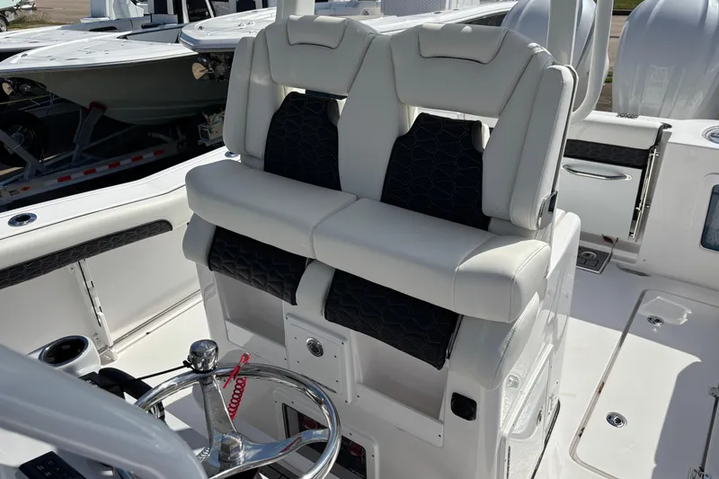 Slide: The Image of 2026 TIDEWATER 282 CENTER CONSOLE ADVENTURE HELM SEAT FLIPPED UP - 13