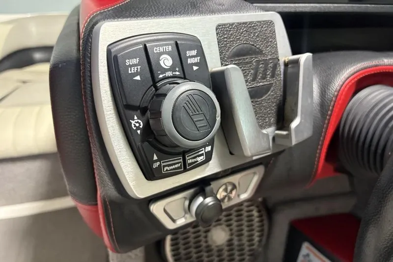 Slide: The Image of Control panel of a 2015 Malibu Wakesetter 247 LSV boat. - 24
