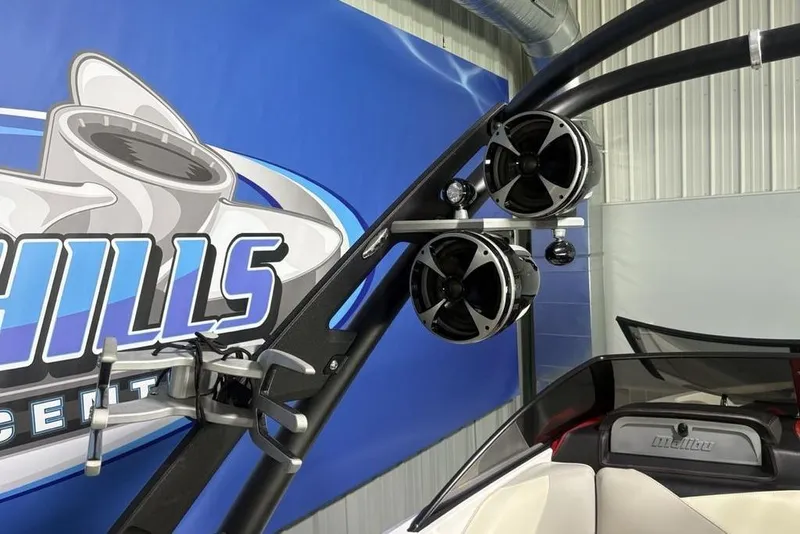 Slide: The Image of 2015 Malibu Wakesetter 247 LSV boat with mounted speakers and wakeboard rack. - 29
