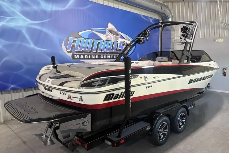 Slide: The Image of 2015 Malibu Wakesetter 247 LSV boat displayed at Foothills Marine Center. - 38