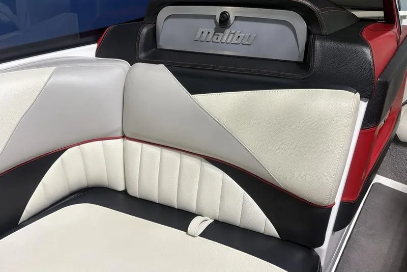 Slide: The Image of 2015 Malibu Wakesetter 247 LSV interior with stylish white, black, and red upholstery. - 7
