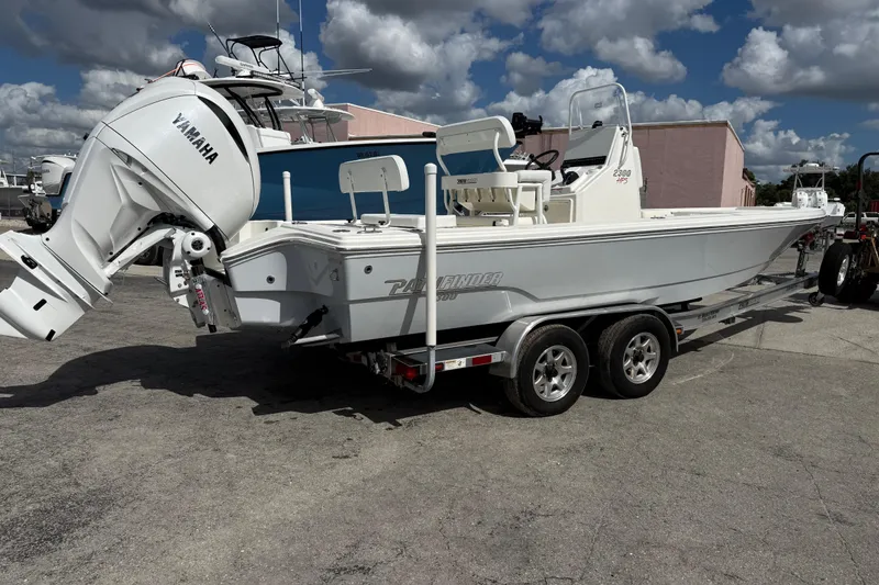 Slide: The Image of 2026 Pathfinder 2300 HPS boat on trailer with Yamaha outboard motor. - 6