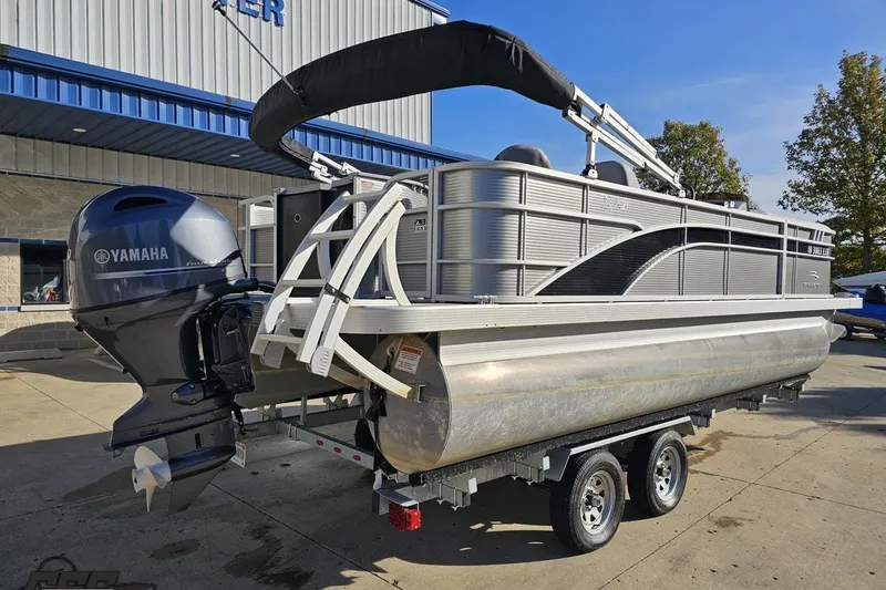 Slide: The Image of 2022 Bennington SX 21 Fishing pontoon boat with Yamaha engine on trailer. - 10