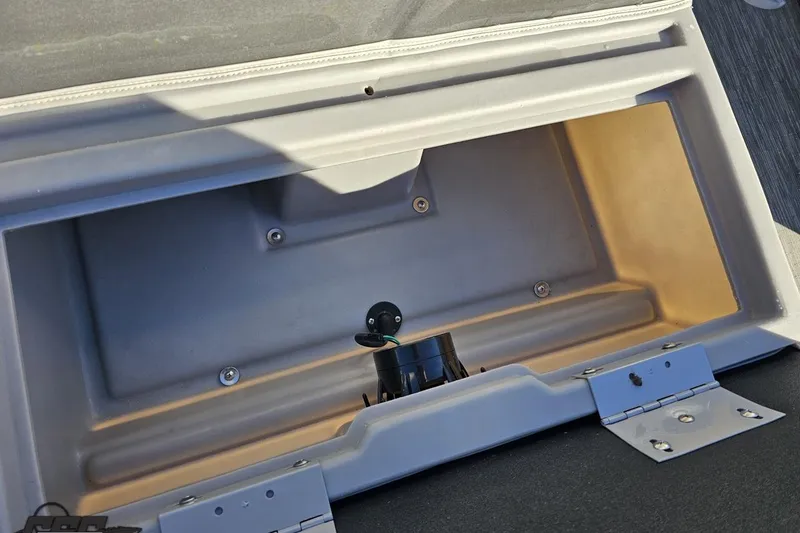 Slide: The Image of Open storage compartment in 2022 Bennington SX 21 Fishing boat. - 101