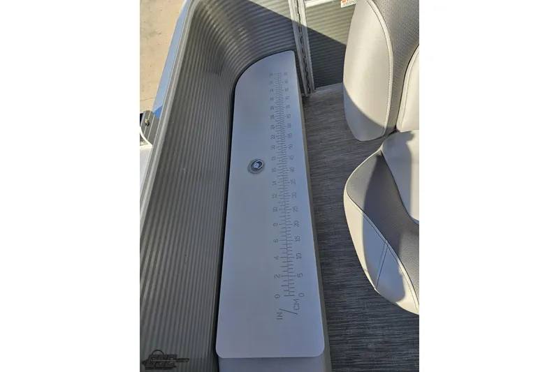 Slide: The Image of 2022 Bennington SX 21 Fishing boat interior with measuring board and seating. - 106