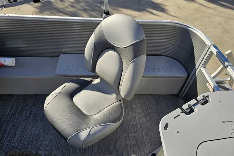 Slide: The Image of 2022 Bennington SX 21 Fishing boat interior with comfortable seating and measuring scale. - 108