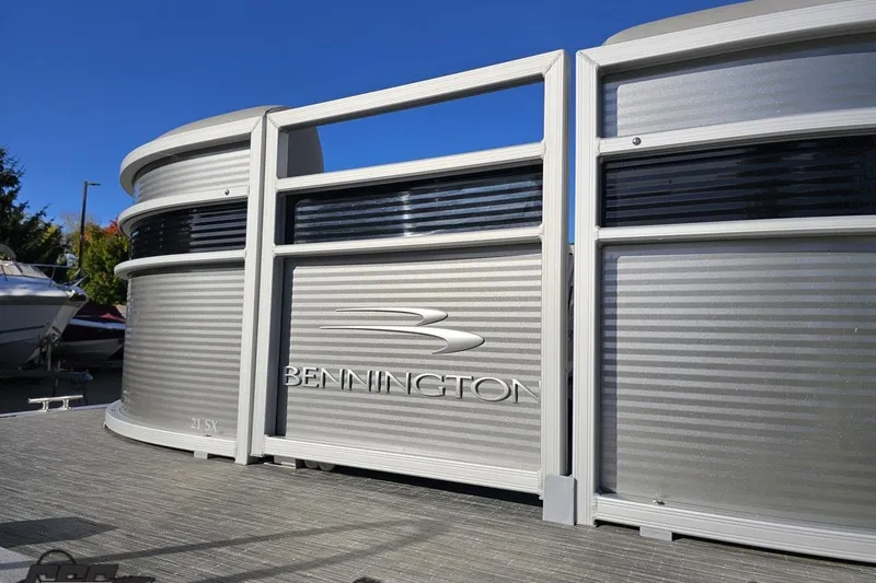 Slide: The Image of 2022 Bennington SX 21 Fishing pontoon boat with sleek silver design. - 17