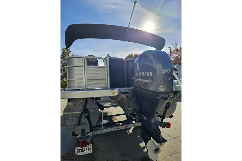 Slide: The Image of 2022 Bennington SX 21 Fishing boat with Yamaha 90 outboard motor in sunlight. - 31