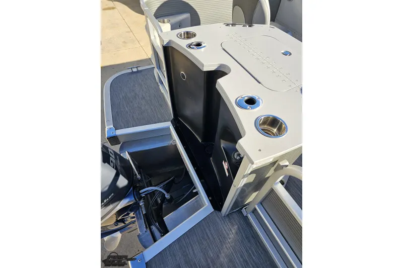 Slide: The Image of 2022 Bennington SX 21 Fishing boat with motor and storage compartments. - 38