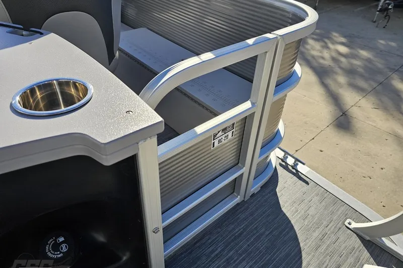 Slide: The Image of 2022 Bennington SX 21 Fishing boat deck with cup holder and railing detail. - 40