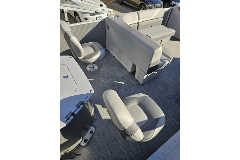 Slide: The Image of 2022 Bennington SX 21 Fishing boat interior with gray seating and modern design. - 44