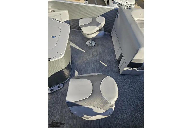 Slide: The Image of 2022 Bennington SX 21 Fishing boat interior with modern seating and sleek design. - 45