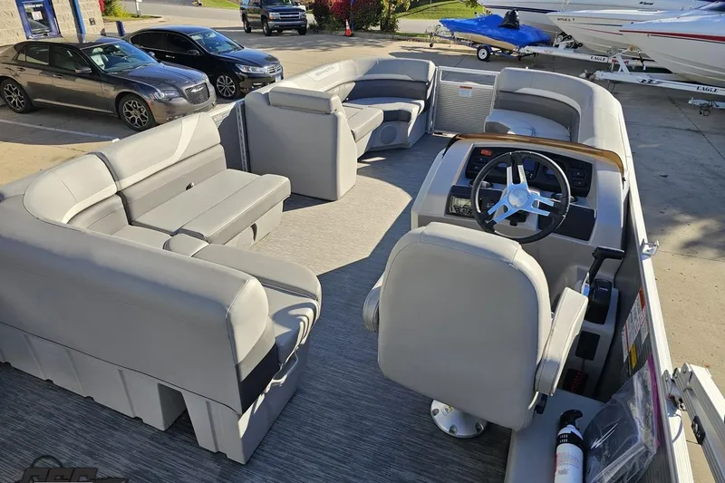 Slide: The Image of 2022 Bennington SX 21 Fishing boat interior with spacious seating and modern helm. - 49