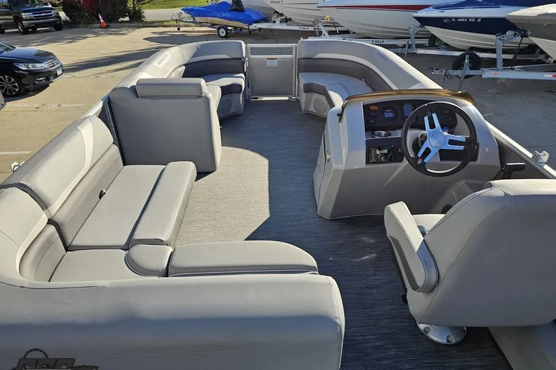 Slide: The Image of 2022 Bennington SX 21 Fishing boat interior with spacious seating and modern helm. - 50