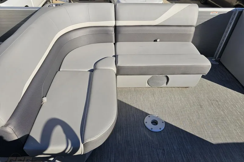 Slide: The Image of 2022 Bennington SX 21 Fishing boat interior with gray cushioned seating. - 53