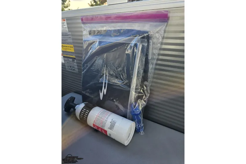Slide: The Image of Ziploc bag and fire extinguisher on Bennington SX 21 Fishing boat, 2022 model. - 59