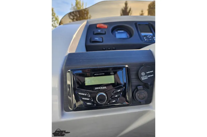 Slide: The Image of Dashboard of 2022 Bennington SX 21 Fishing boat with audio system and controls. - 65