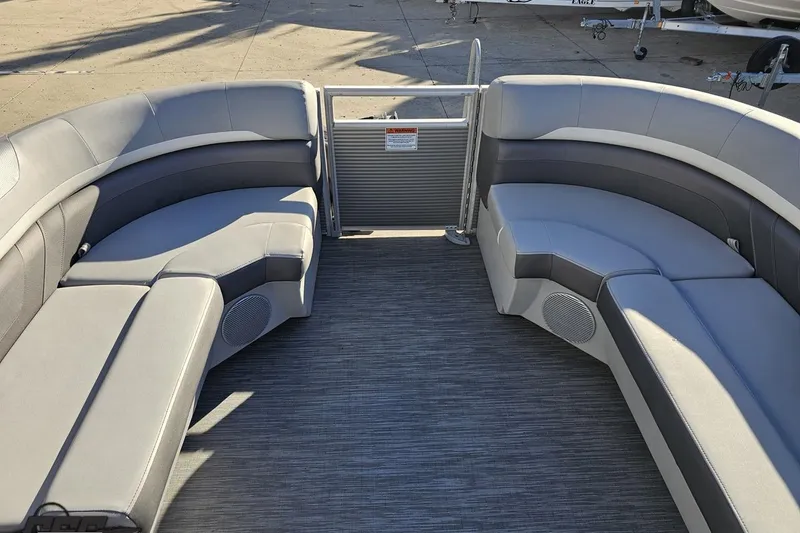 Slide: The Image of 2022 Bennington SX 21 Fishing boat interior with gray seating and spacious layout. - 78