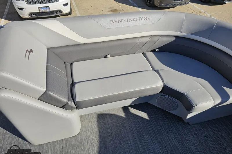 Slide: The Image of 2022 Bennington SX 21 Fishing boat interior with gray cushioned seating. - 85