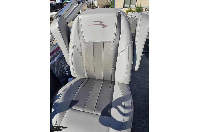 Slide: The Image of 2022 Bennington SX 21 Fishing boat seat with stylish gray upholstery and logo. - 94
