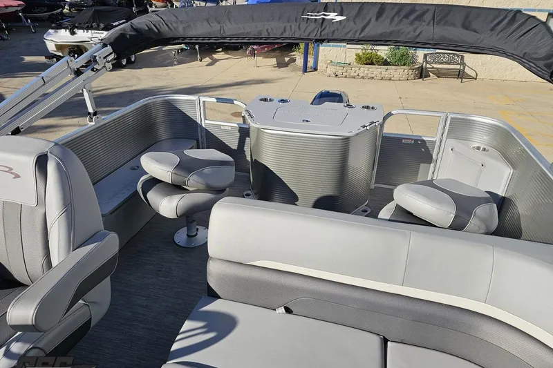 Slide: The Image of 2022 Bennington SX 21 Fishing boat interior with seating and helm station. - 96