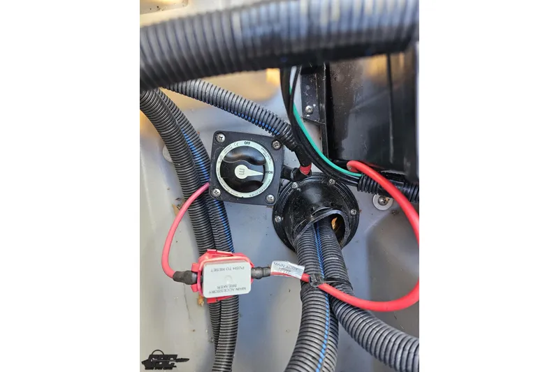 Slide: The Image of 2022 Bennington SX 21 Fishing boat wiring and switch panel close-up. - 99