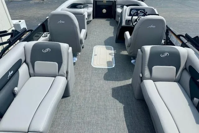 Slide: The Image of 2026 Barletta A22QC boat interior with gray seating and modern dashboard. - 3