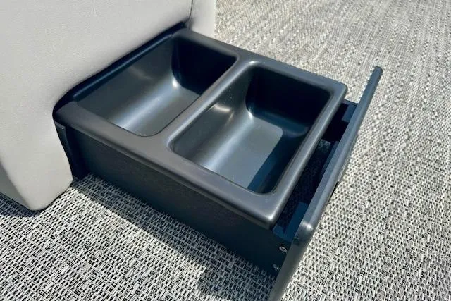 Slide: The Image of Cup holder drawer in 2026 Barletta A22QC boat, featuring dual compartments. - 9