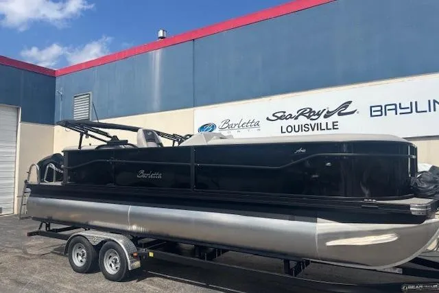 The Image of 2026 Barletta A24QC pontoon boat on trailer at dealership, Louisville. - 0
