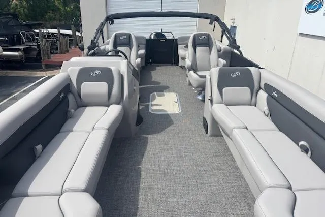 Slide: The Image of 2026 Barletta A24QC pontoon boat with spacious seating and modern design. - 5
