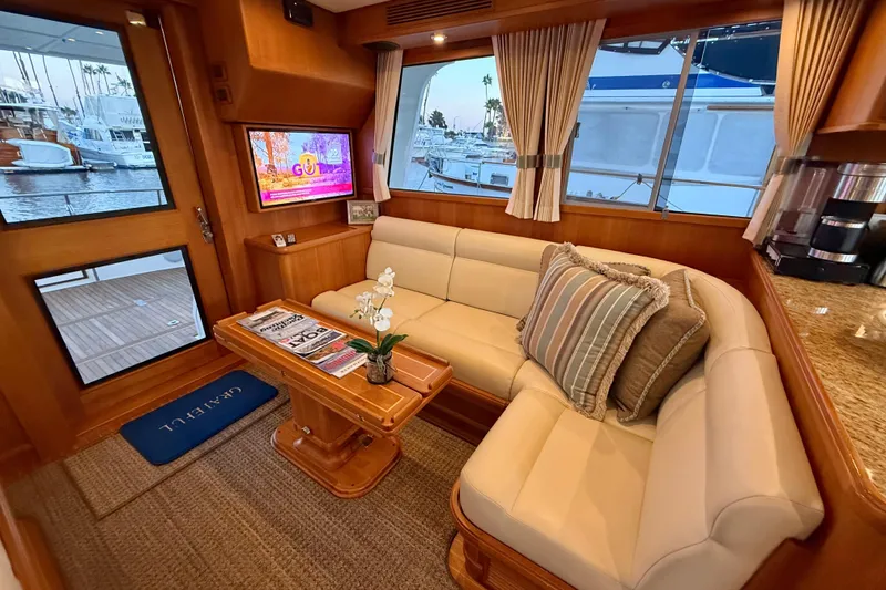 Slide: The Image of Luxurious interior of 2009 Grand Banks 47 Heritage EU yacht with cozy seating and elegant decor. - 16