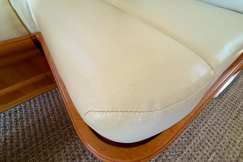 Slide: The Image of Cream leather seating with wooden trim on 2009 Grand Banks 47 Heritage EU yacht. - 23