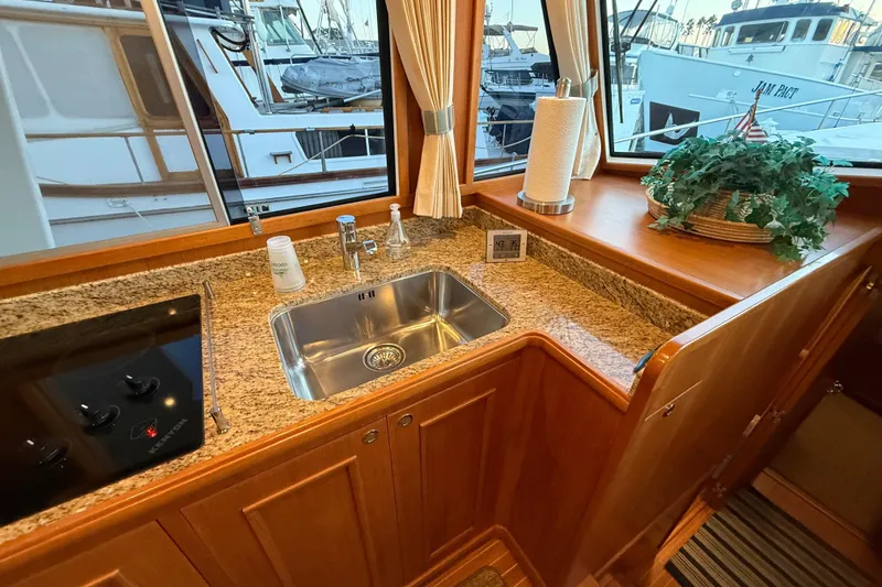 Slide: The Image of Kitchen area of 2009 Grand Banks 47 Heritage EU yacht with granite countertops. - 29