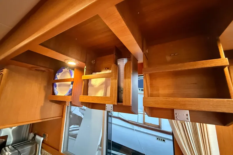 Slide: The Image of Wooden cabinets in a 2009 Grand Banks 47 Heritage EU yacht interior. - 32