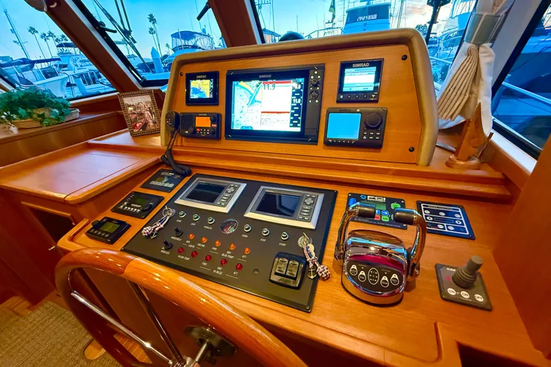 Slide: The Image of Helm of 2009 Grand Banks 47 Heritage EU with navigation equipment and controls. - 39
