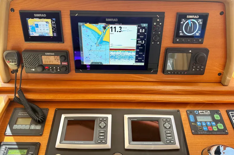 Slide: The Image of Navigation dashboard of 2009 Grand Banks 47 Heritage EU with Simrad electronics. - 40