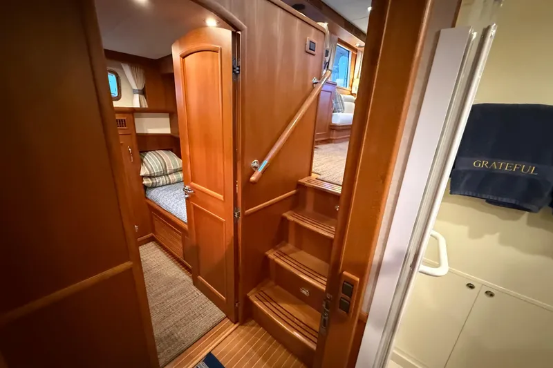 Slide: The Image of Luxurious interior of 2009 Grand Banks 47 Heritage EU yacht with wooden finishes and cozy cabin. - 41