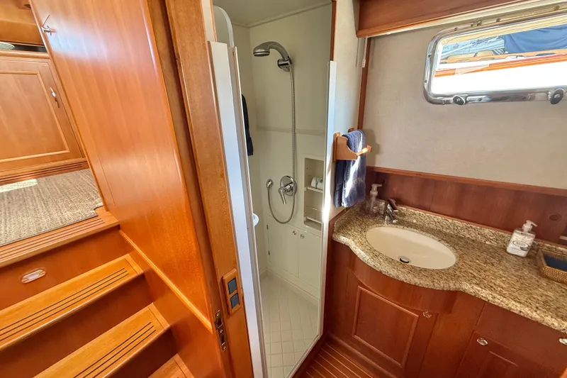 Slide: The Image of Luxurious bathroom interior of 2009 Grand Banks 47 Heritage EU yacht with wooden finishes. - 45
