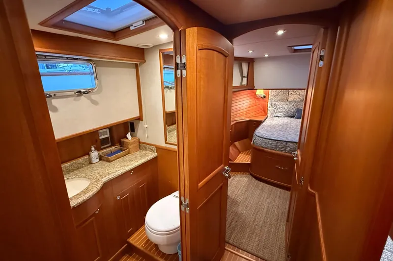 Slide: The Image of Luxurious 2009 Grand Banks 47 Heritage EU yacht interior with bedroom and bathroom. - 49