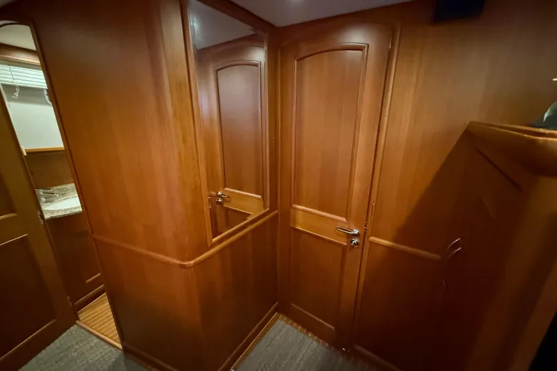 Slide: The Image of Interior of 2009 Grand Banks 47 Heritage EU yacht with wooden doors and paneling. - 57